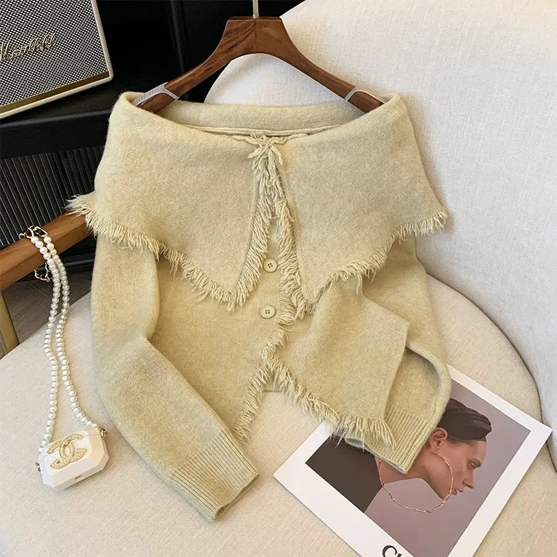 Fashionable, age-reducing, high-end and super-good-looking solid color tassel one-line collar long-sleeved bottoming sweater top